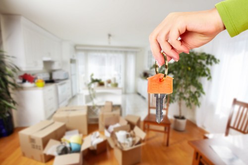 Careful loading of boxes and furniture for a house move in North London