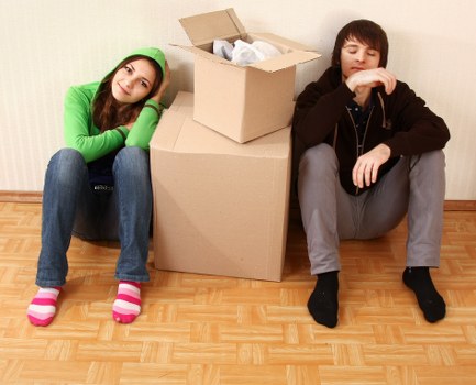 Professional removals crew navigating stairs and access challenges