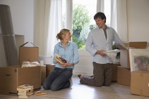 Moving large furniture items safely through a North London property access point