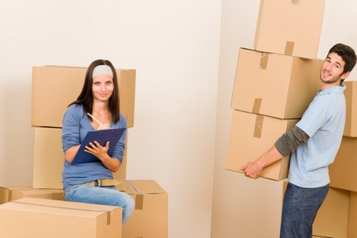 Packed office boxes and furniture ready for relocation
